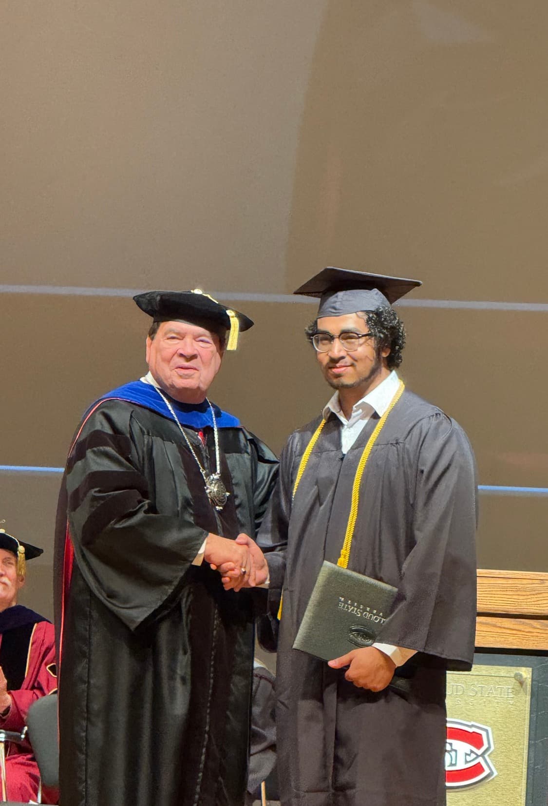 Ashesh Nepal at SCSU graduation ceremony